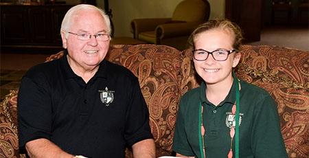 Young author presents book to TFS president
